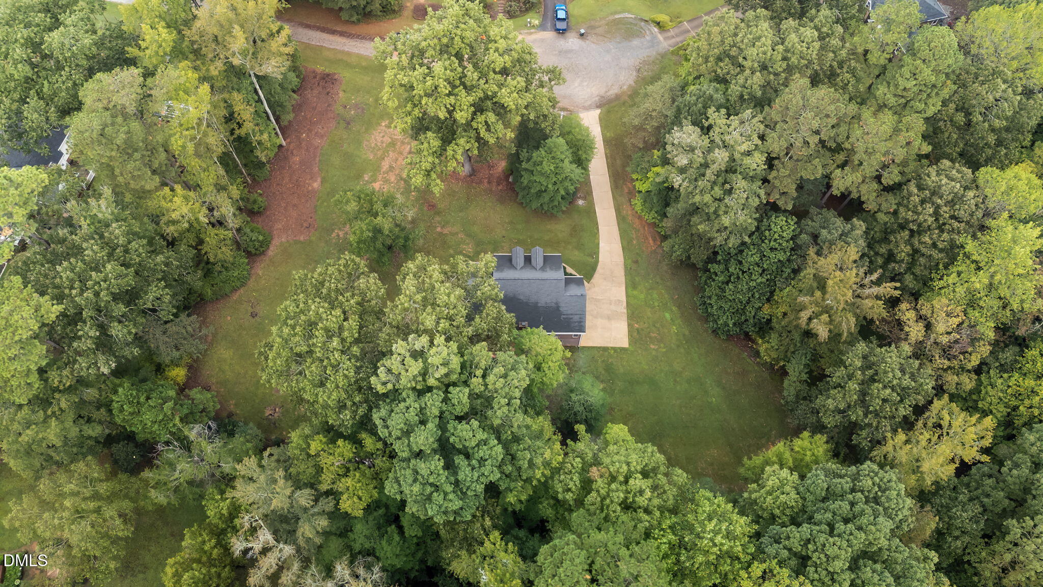 208 Adams Court Clayton, NC 27520 - Photo 55 of 63 an aerial view of a house with a yard