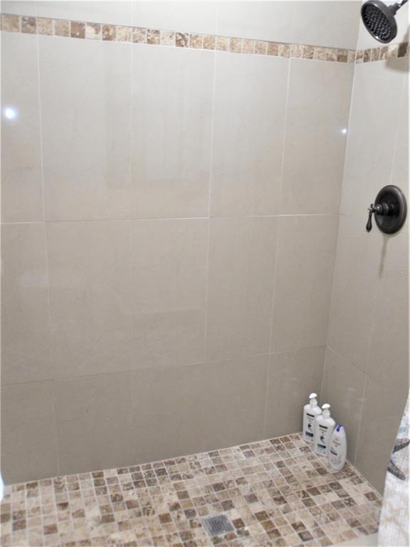 13711 Gulf Boulevard, Unit 1 Madeira Beach, FL 33708 - Photo 21 of 36 a view of a closet