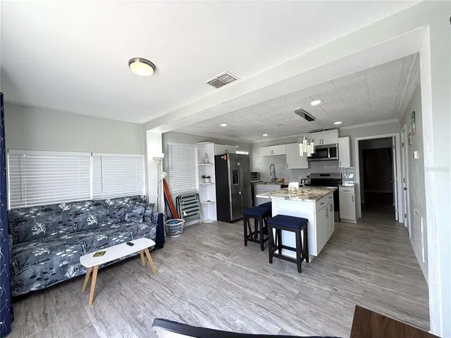 a view of a swimming pool with a chairs