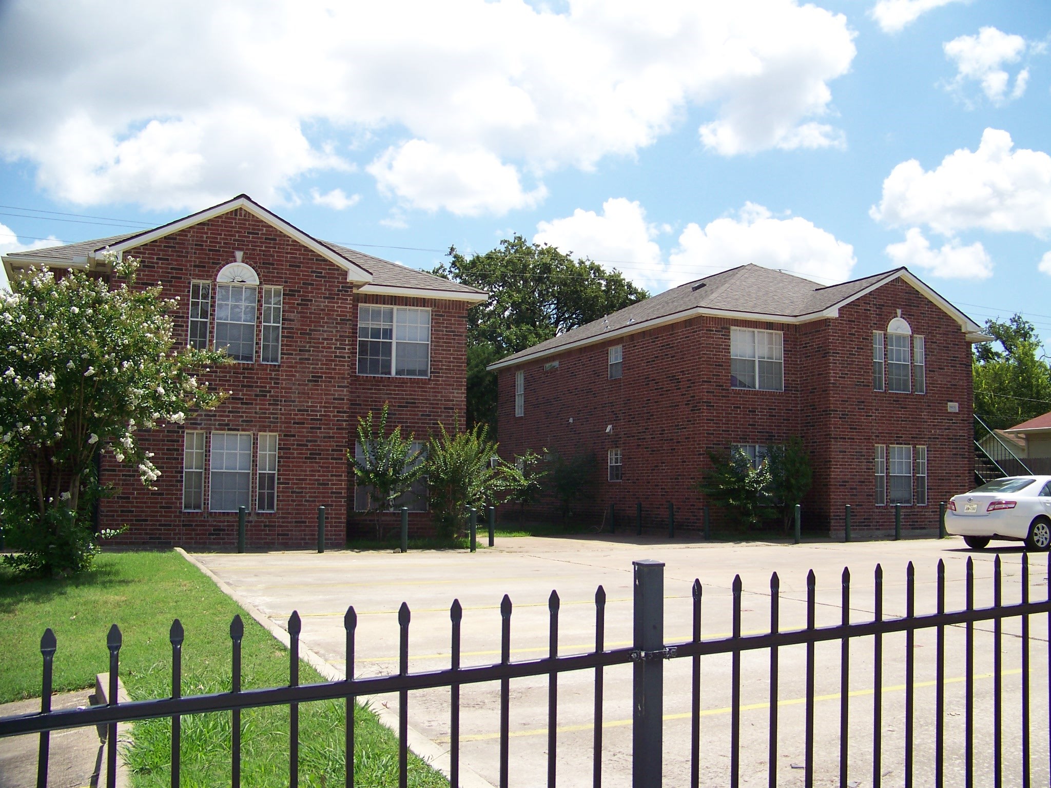 3901 College Main Street, Unit B Bryan, TX 77801 - Photo 3 of 25 a front view of a house with a yard