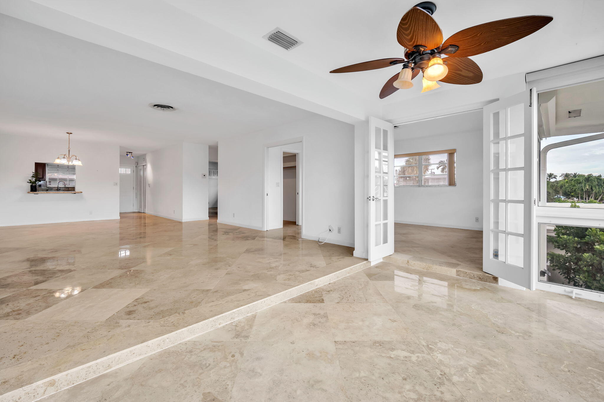 2400 Northeast 36th Street, Unit 7 Lighthouse Point, FL 33064 - Photo 21 of 27 a view of empty room with wooden floor