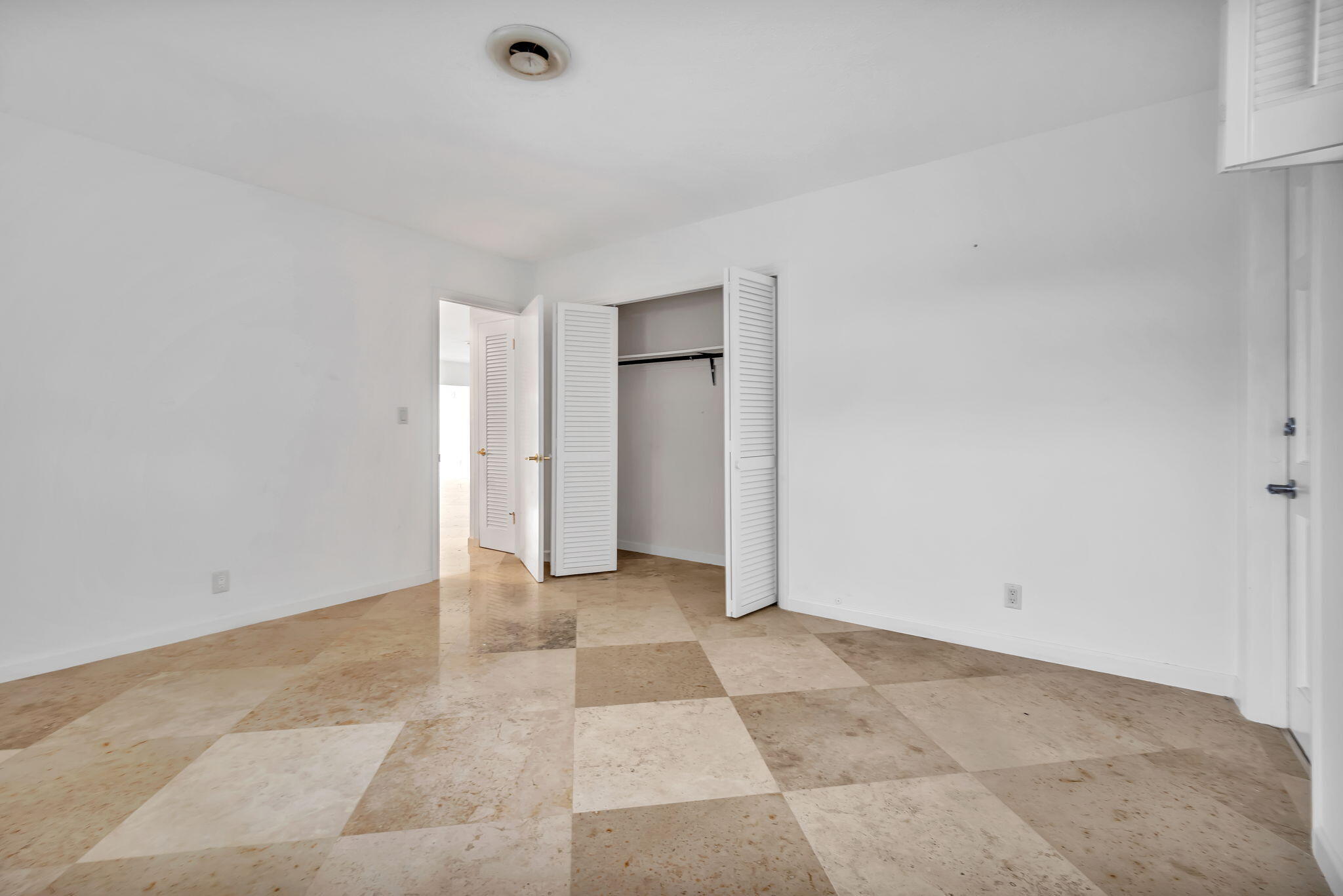 2400 Northeast 36th Street, Unit 7 Lighthouse Point, FL 33064 - Photo 22 of 27 a view of an empty room