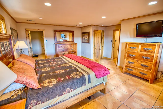 a bedroom with a bed and furniture