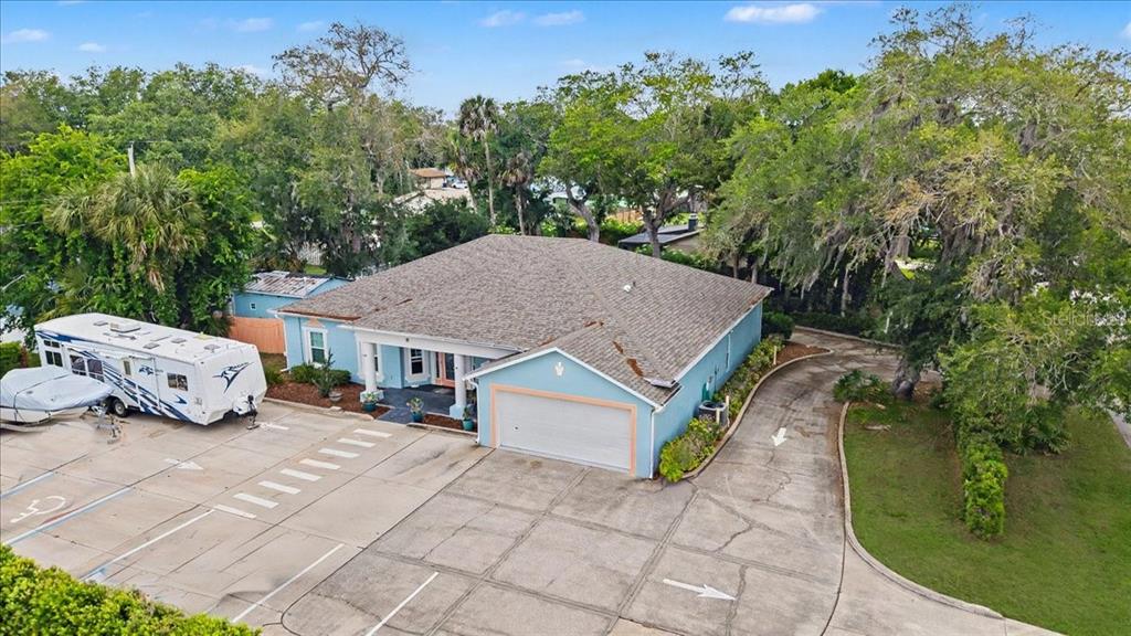 a aerial view of a house with garden