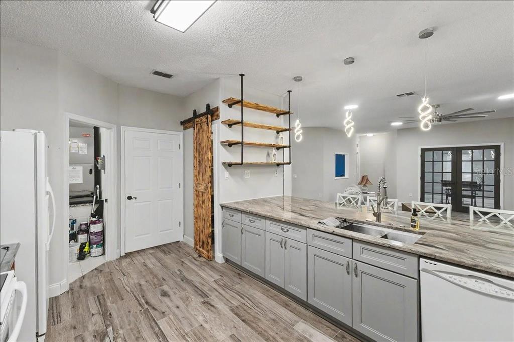 1830 Orange Tree Drive Edgewater, FL 32132 - Photo 7 of 23 a bathroom with a sink double vanity and shower