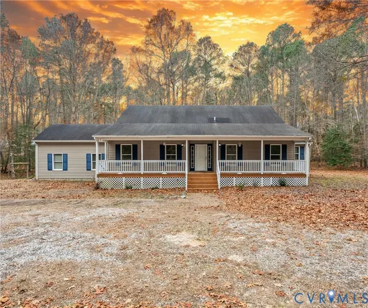 a house with trees in the background