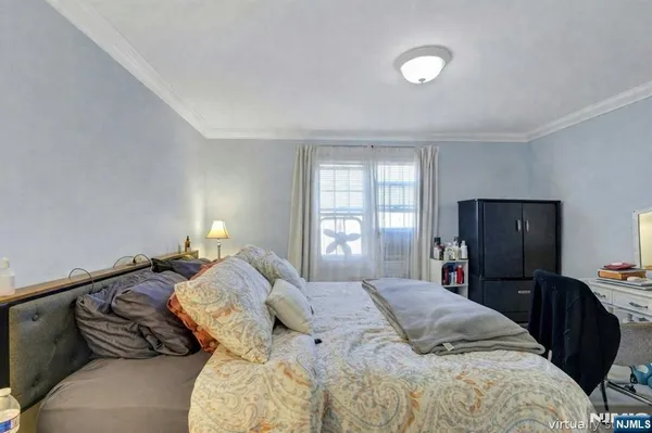 a bedroom with a bed and a closet
