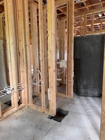 a view of a utility room with a door