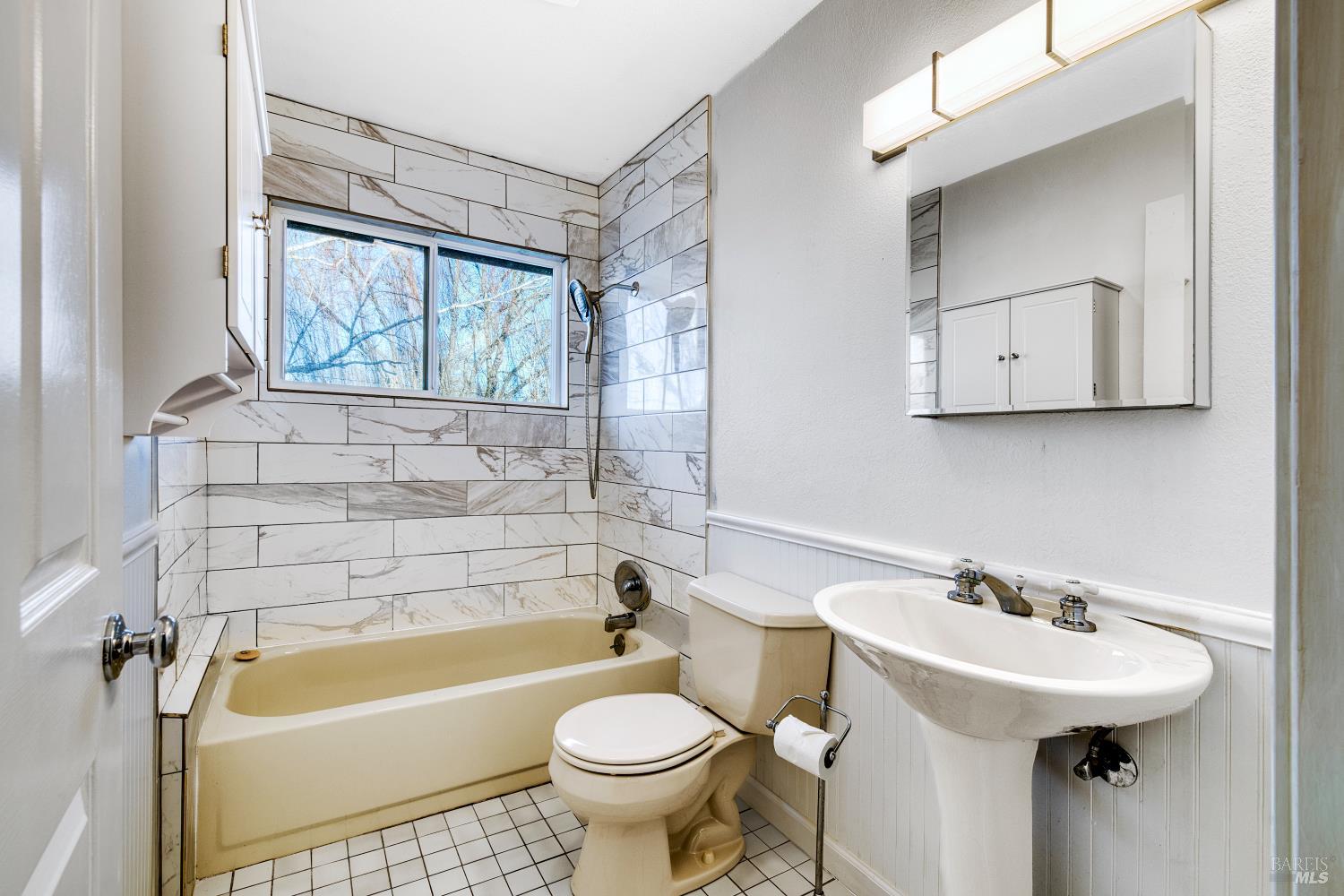 1534 Buchanan Street Novato, CA 94947 - Photo 20 of 30 a bathroom with a sink a toilet and bathtub