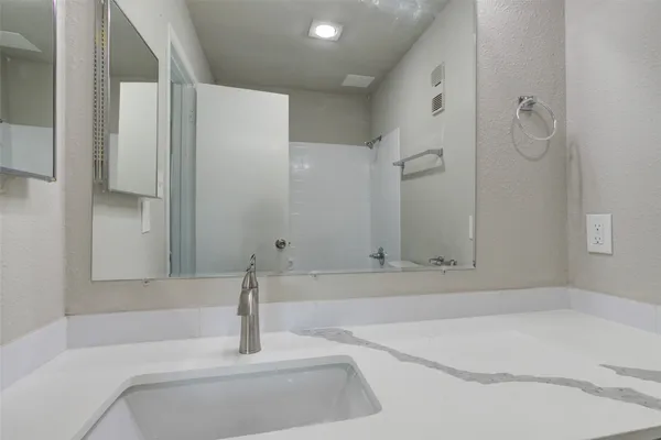 a bathroom with a bathtub