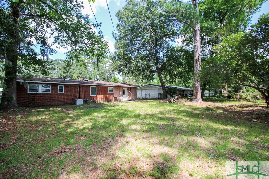 409 Sharondale Road Savannah, GA 31419 - Photo 18 of 26 Spacious backyard