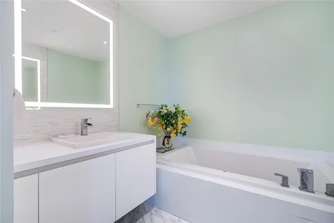 a bathroom with a sink and a bathtub