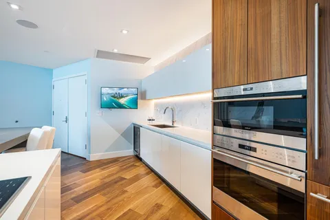 a kitchen with a stove and a microwave