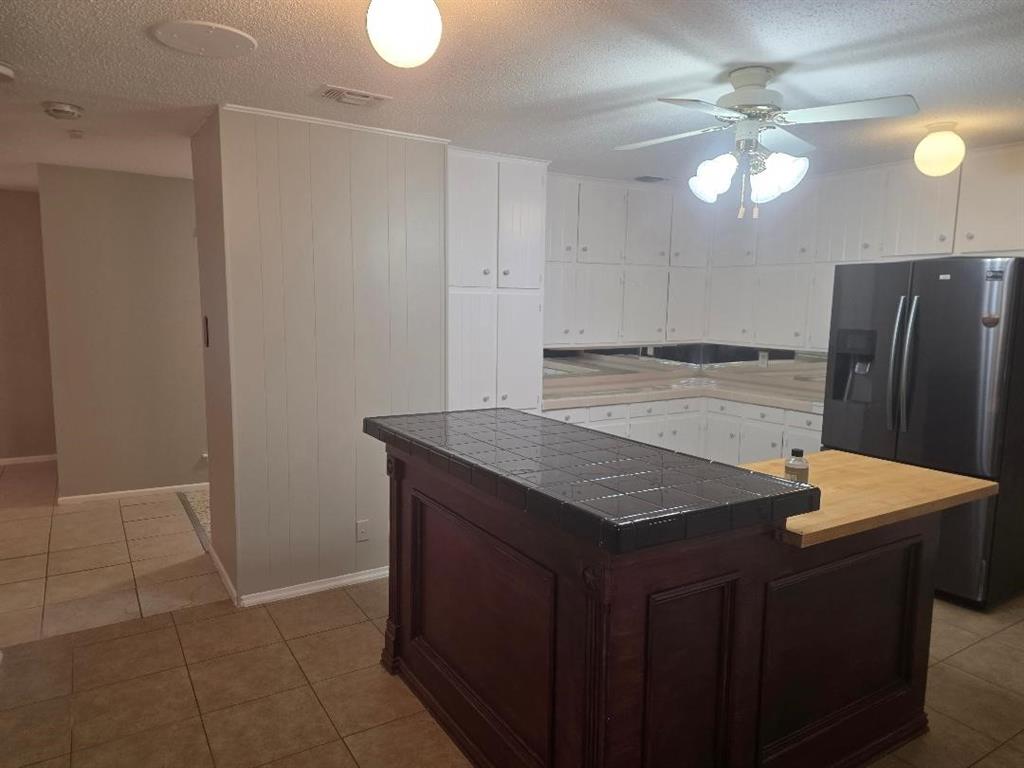 Undisclosed Address Hurst, TX 76054 - Photo 6 of 29 PLENTY OF CABINETS AND COUNTER FOR THE GOURMET COOK