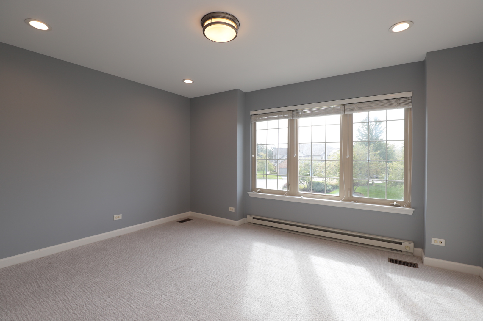 1802 Camden Drive Glenview, IL 60025 - Photo 15 of 21 an empty room with a empty space and windows