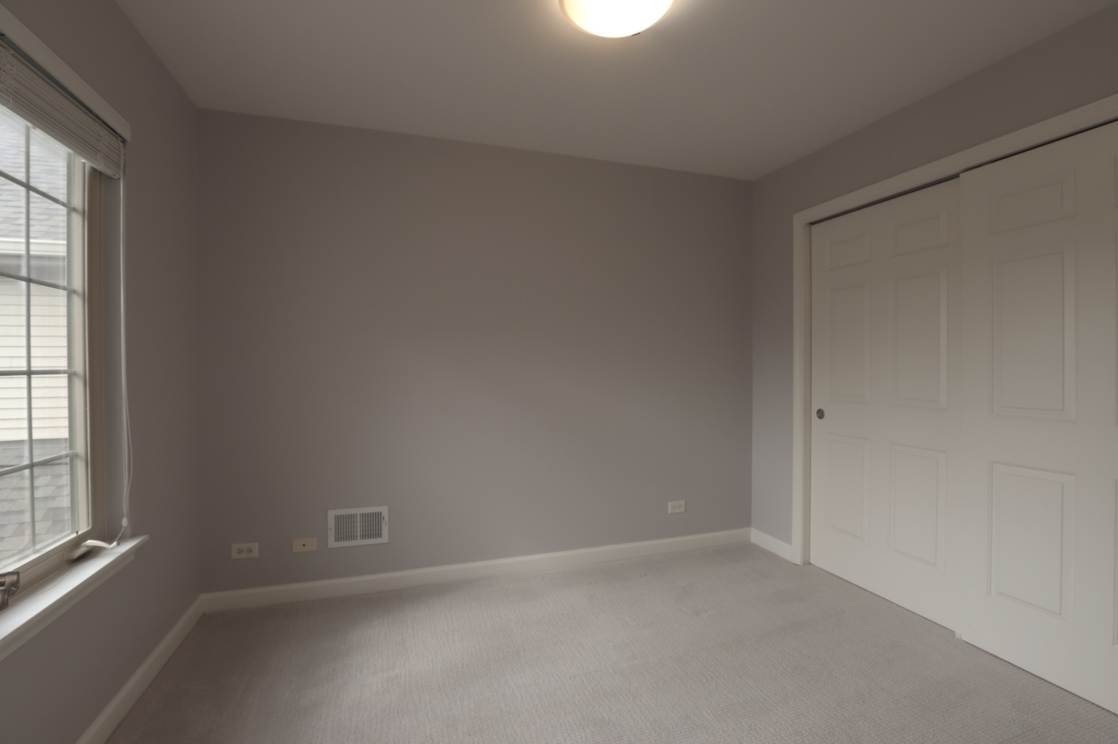 1802 Camden Drive Glenview, IL 60025 - Photo 16 of 21 an empty room with a window