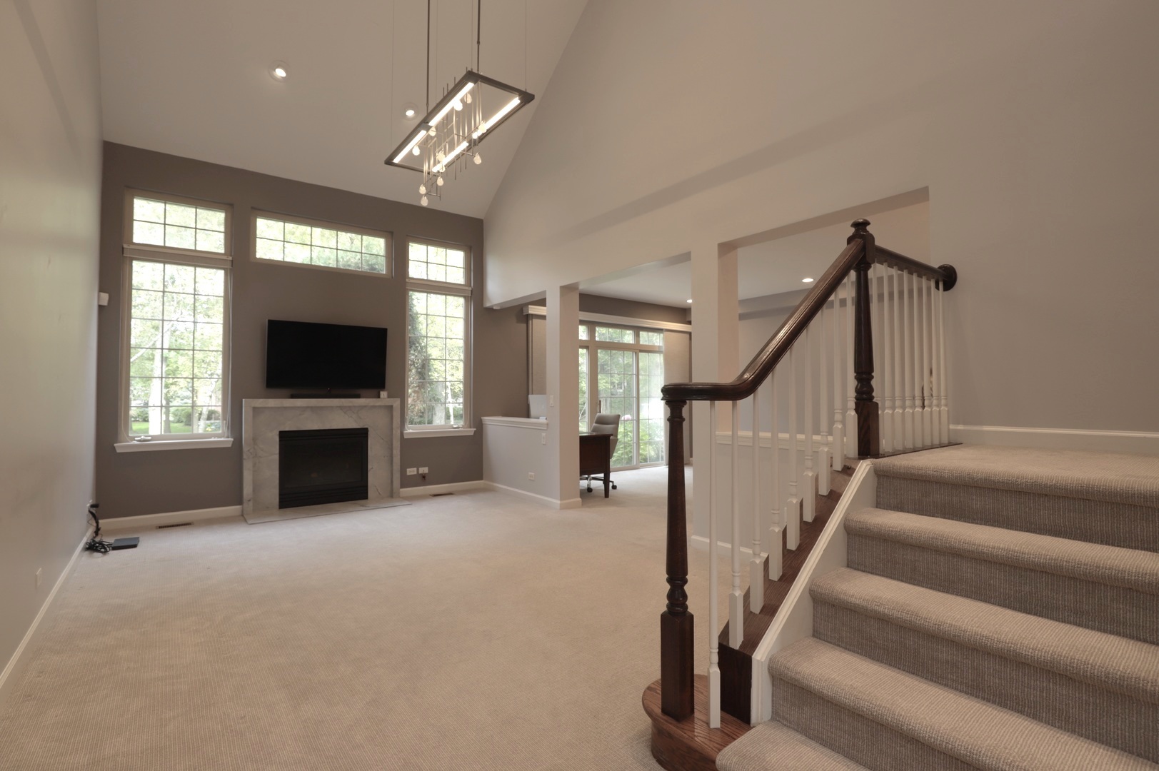 1802 Camden Drive Glenview, IL 60025 - Photo 3 of 21 a view of a livingroom with a fireplace and furniture