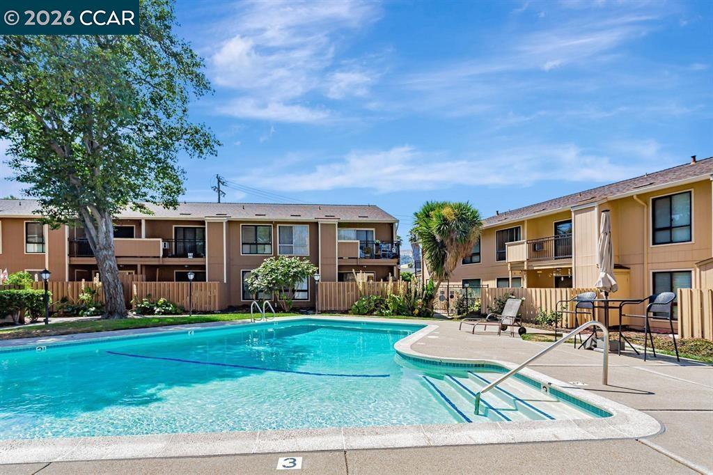 8975 Alcosta Boulevard, Unit 116 San Ramon, CA 94583 - Photo 16 of 30 a front view of house with yard and green space