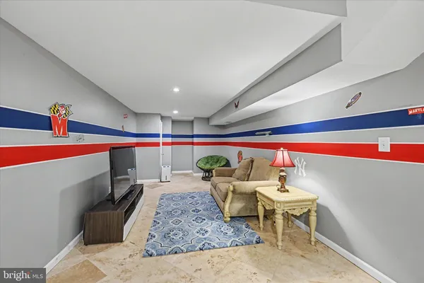 a room with furniture and a potted plant