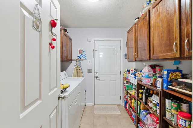 a room with lots of clutter and storage