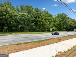 5655 Covington Highway Decatur, GA 30035 - Photo 11 of 15 a view of a swimming pool with a yard