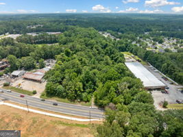 5655 Covington Highway Decatur, GA 30035 - Photo 2 of 15 an aerial view of residential houses with outdoor space and trees