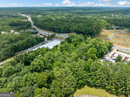5655 Covington Highway Decatur, GA 30035 - Photo 5 of 15 a view of a green yard with large trees