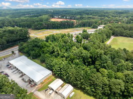 5655 Covington Highway Decatur, GA 30035 - Photo 7 of 15 an aerial view of a house with a yard and lake view