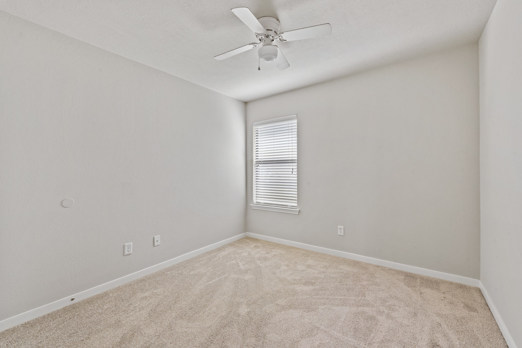 2041 Mountain Wind Loop Bryan, TX 77807 - Photo 14 of 17 Bedroom 3 with ceiling fan