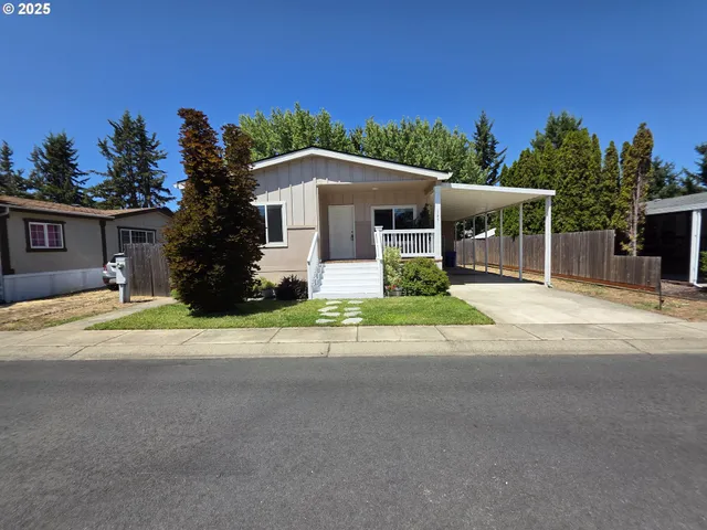 front view of a house with a street