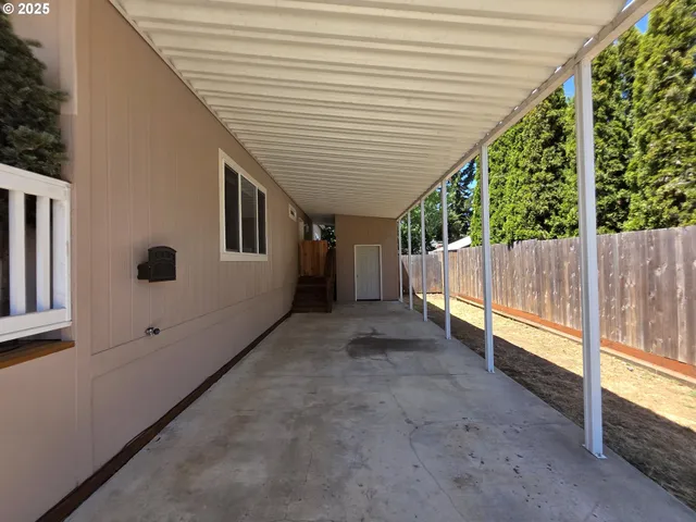 a view of backyard with green space