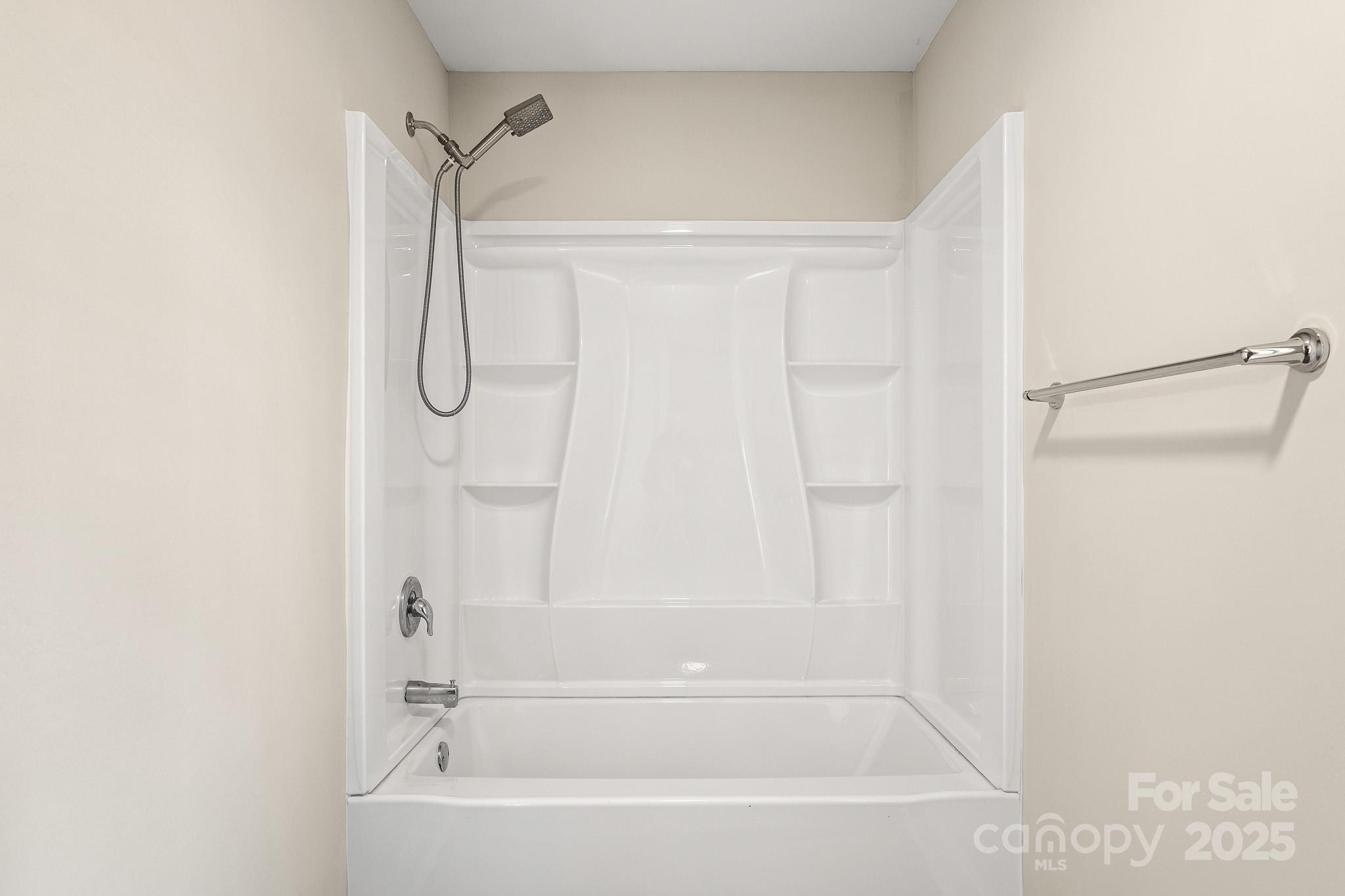 1219 Calhoun Street Rock Hill, SC 29732 - Photo 18 of 33 a bathroom with a shower and a bath tub