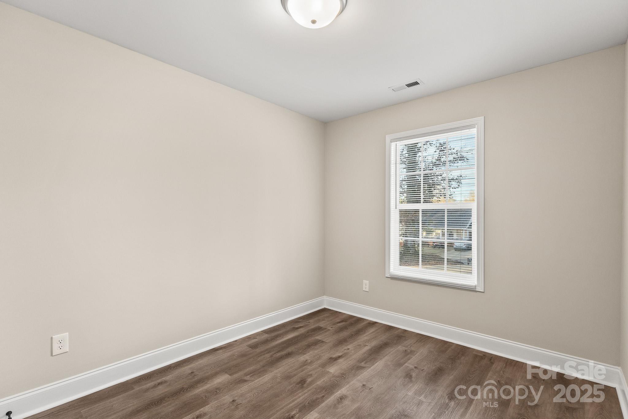 1219 Calhoun Street Rock Hill, SC 29732 - Photo 24 of 33 an empty room with a window