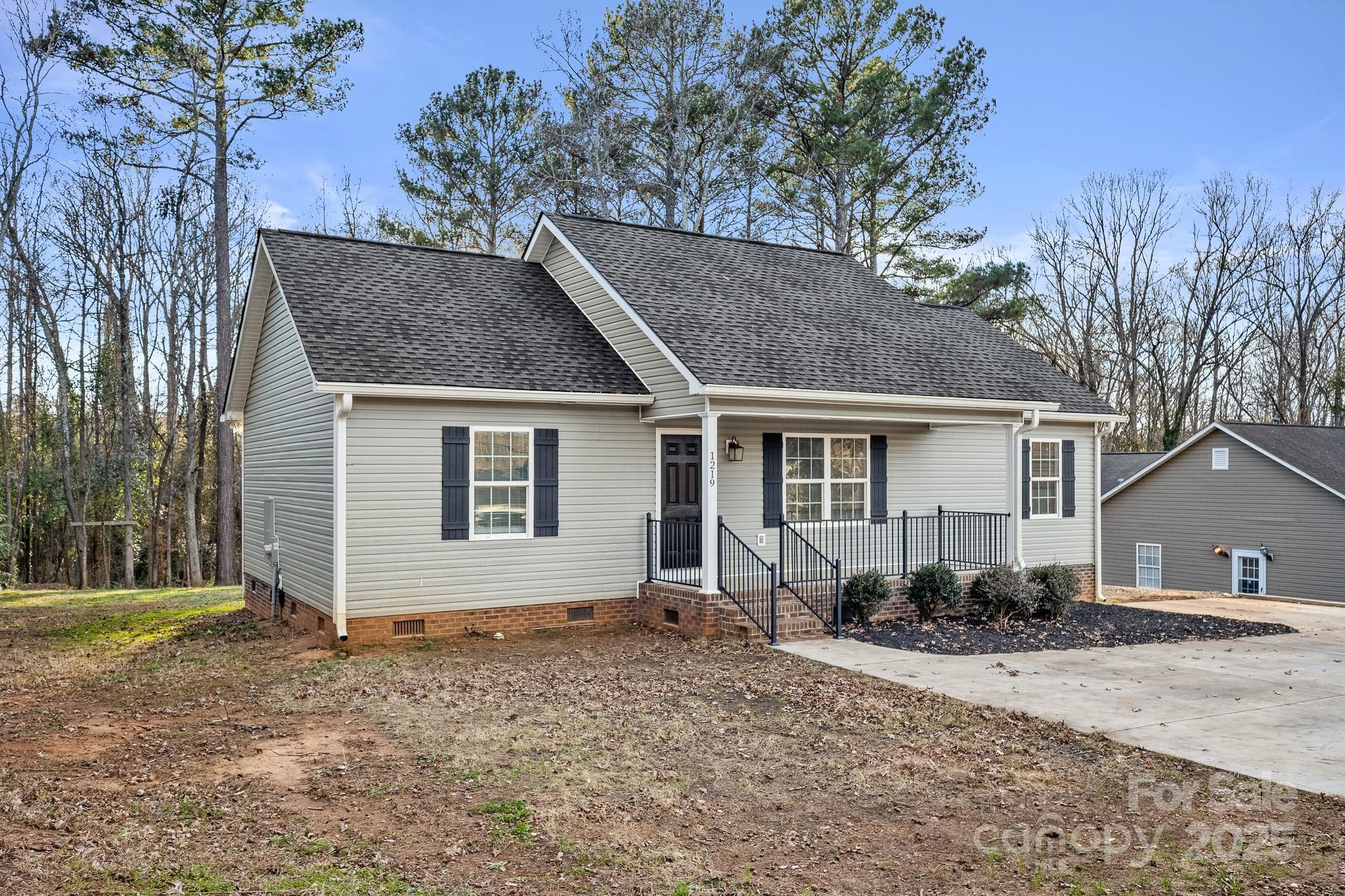 1219 Calhoun Street Rock Hill, SC 29732 - Photo 29 of 33 a view of a house with a yard and large tree