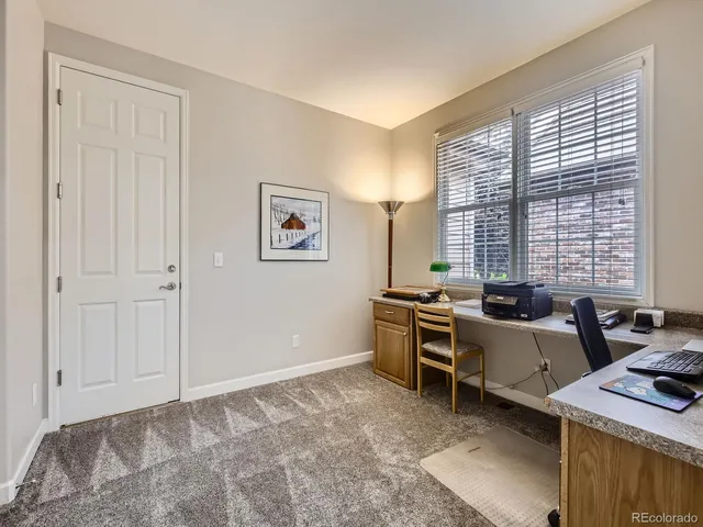 a room with a bed and a window