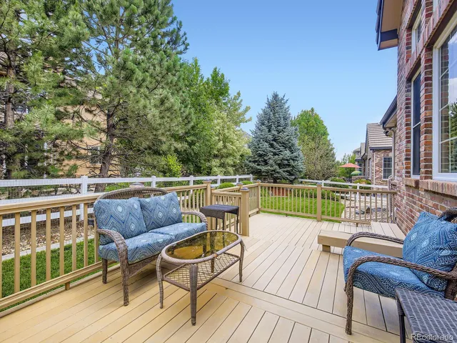 a view of a chairs on the roof deck