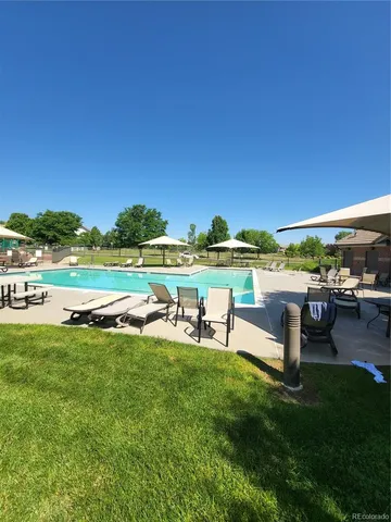a view of a garden with a lake