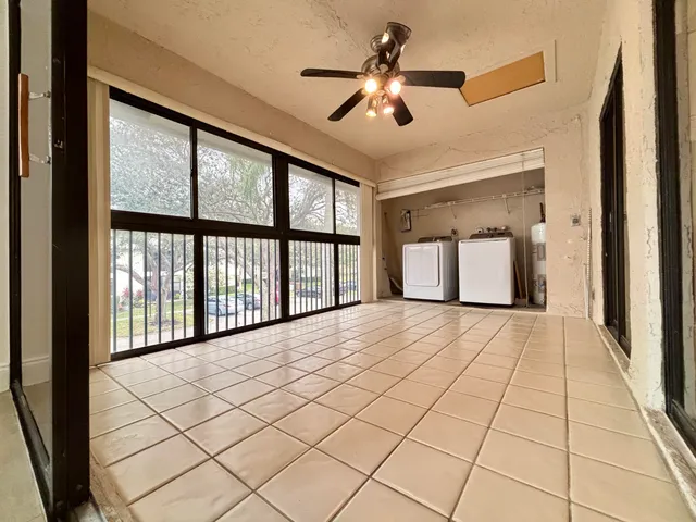 a view of an empty room and window