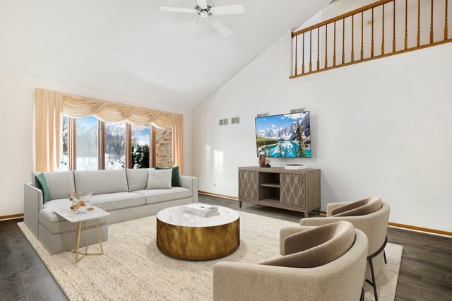 14518 Golf Road Orland Park, IL 60462 - Photo 12 of 42 a living room with furniture and a potted plant