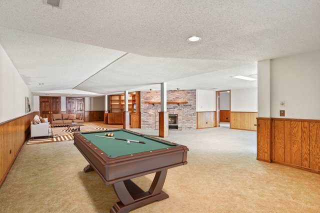 14518 Golf Road Orland Park, IL 60462 - Photo 28 of 42 a living room with furniture pool table and flat screen tv