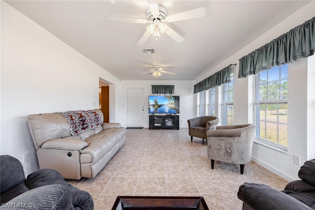 7764 14th Place LaBelle, FL 33935 - Photo 18 of 34 a living room with furniture and a window