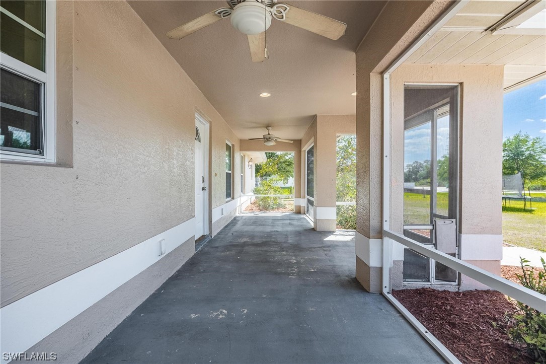 7764 14th Place LaBelle, FL 33935 - Photo 2 of 34 a view of an entryway with wooden floor and door