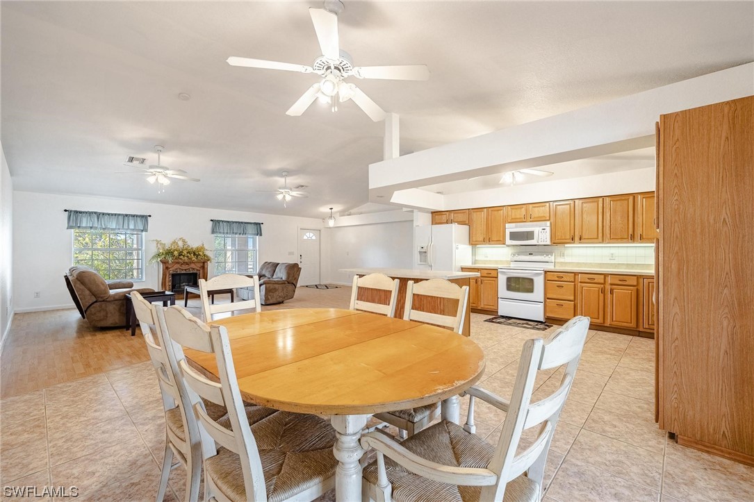 7764 14th Place LaBelle, FL 33935 - Photo 10 of 34 a view of a dining room with furniture