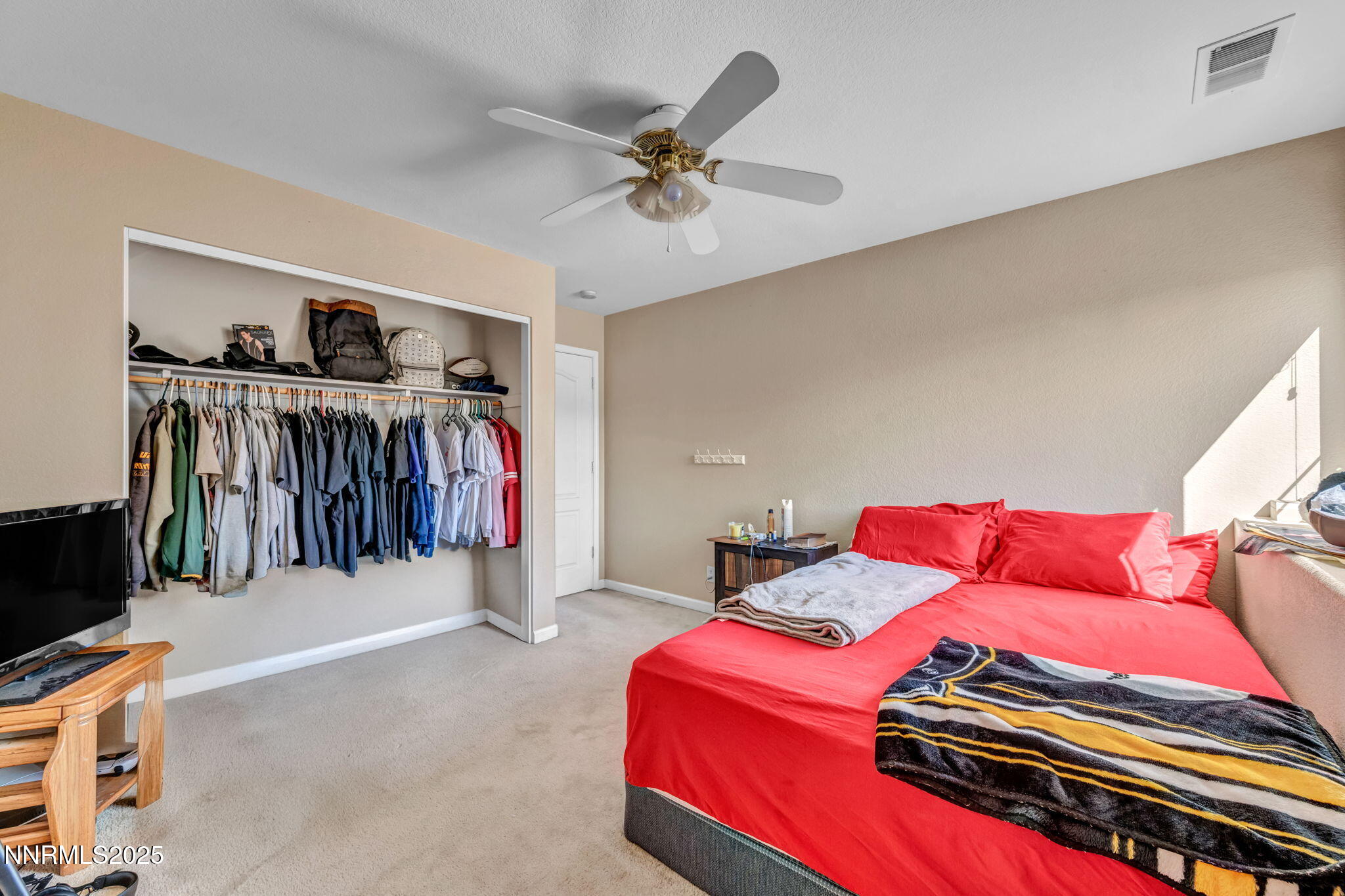 2971 Fox Trail Drive Reno, NV 89523 - Photo 25 of 45 a living room with lots of furniture and a flat screen tv