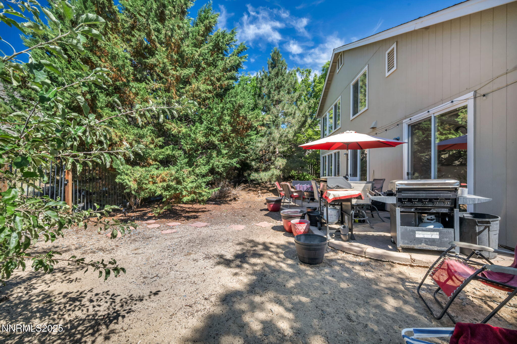2971 Fox Trail Drive Reno, NV 89523 - Photo 33 of 45 an outdoor space with patio and white umbrellas