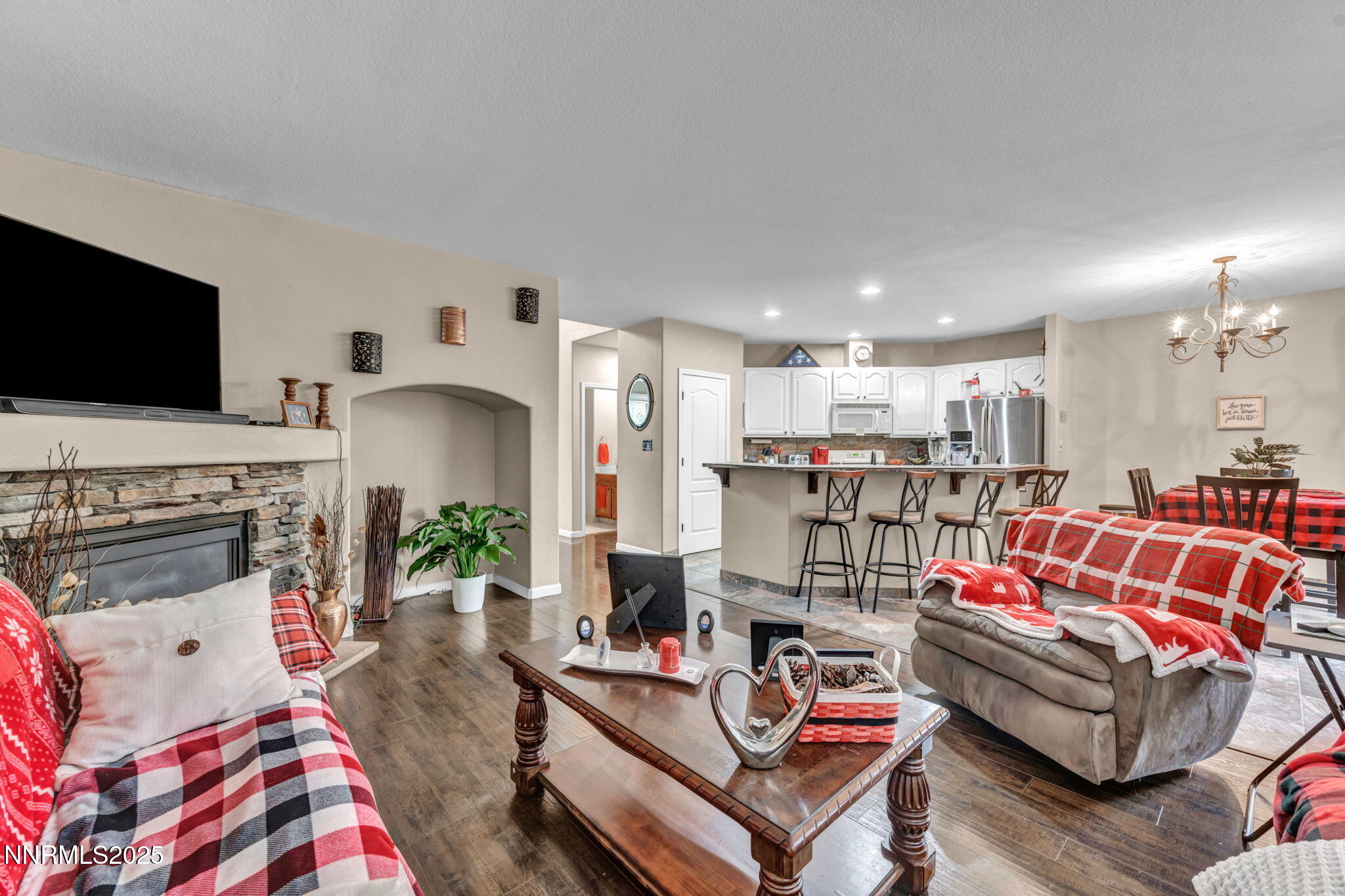 2971 Fox Trail Drive Reno, NV 89523 - Photo 7 of 45 a living room with furniture and a flat screen tv