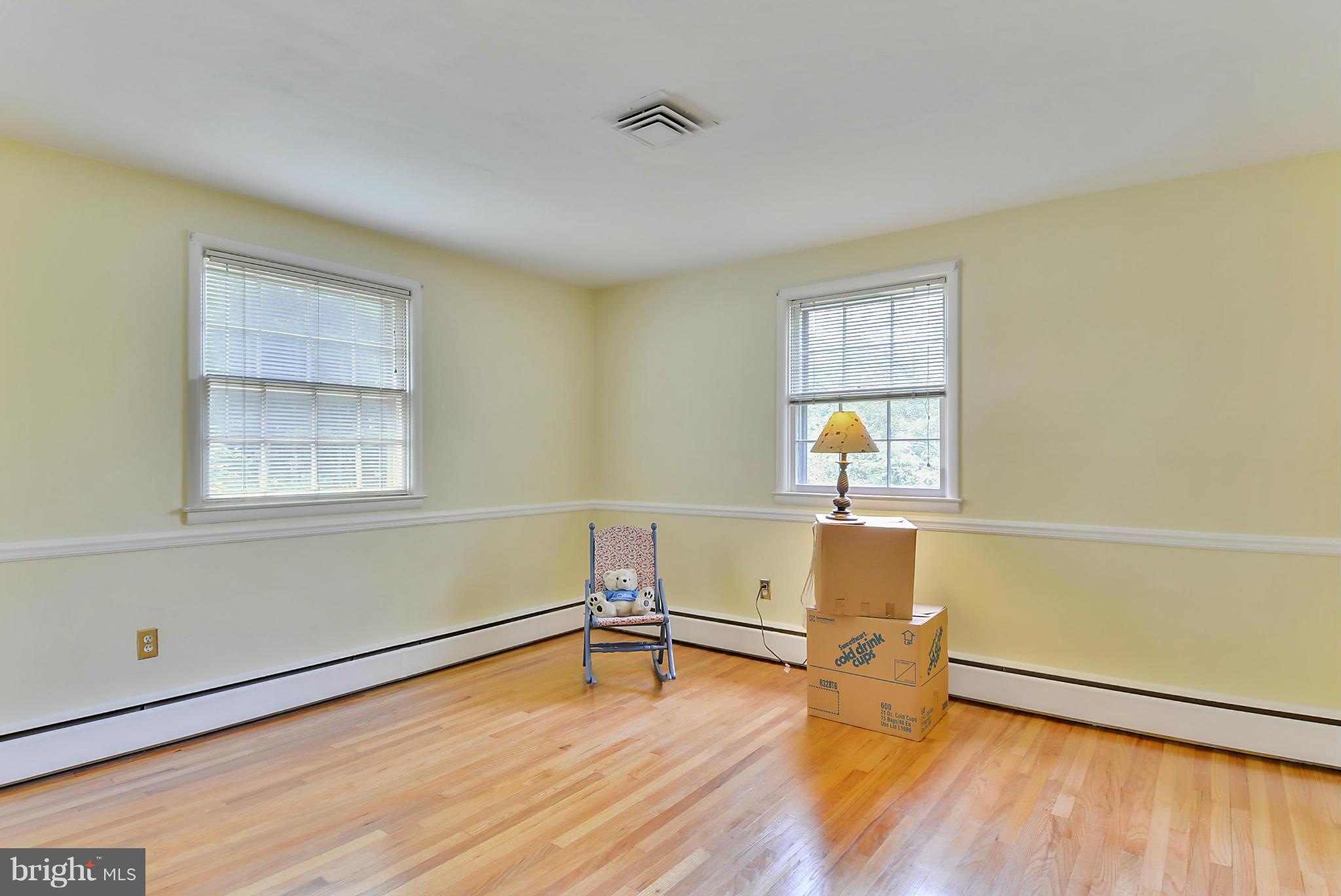 214 East Ridgely Road Lutherville-Timonium, MD 21093 - Photo 22 of 30 Bedroom #2 with refinished hardwoods