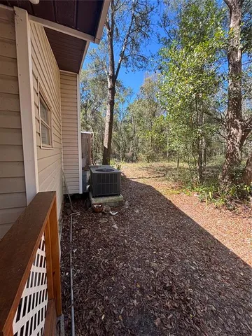 a backyard of a house with a yard