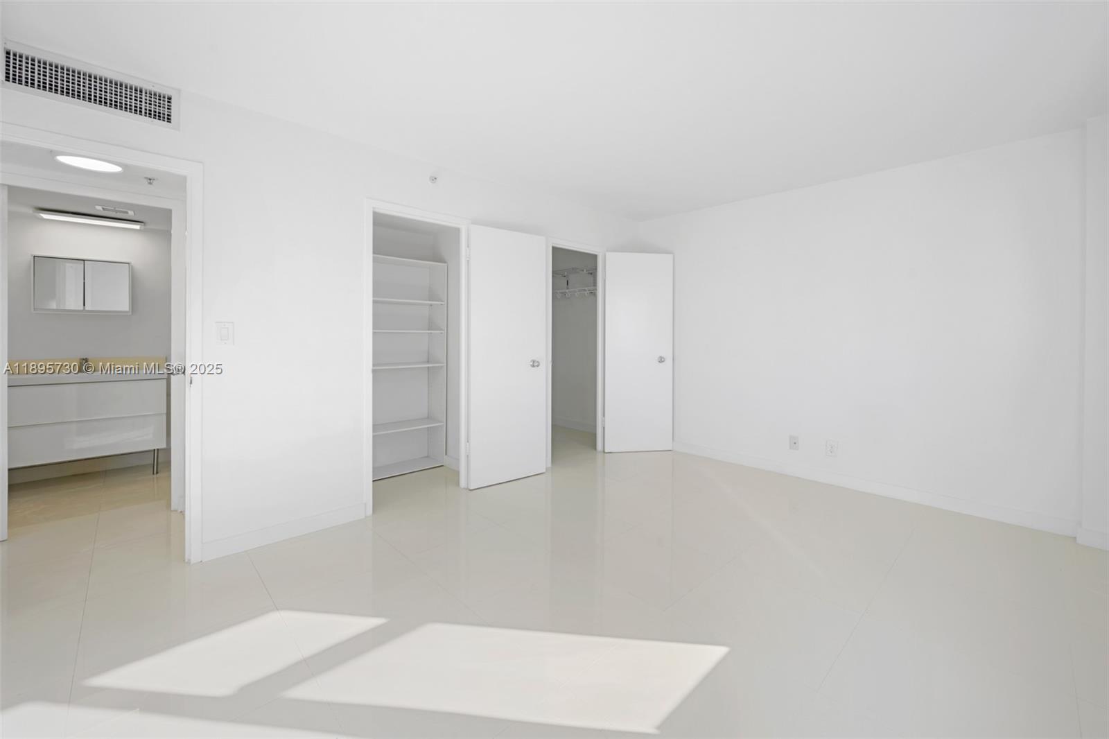 9195 Collins Avenue, Unit 812 Surfside, FL 33154 - Photo 12 of 20 a view of an empty room