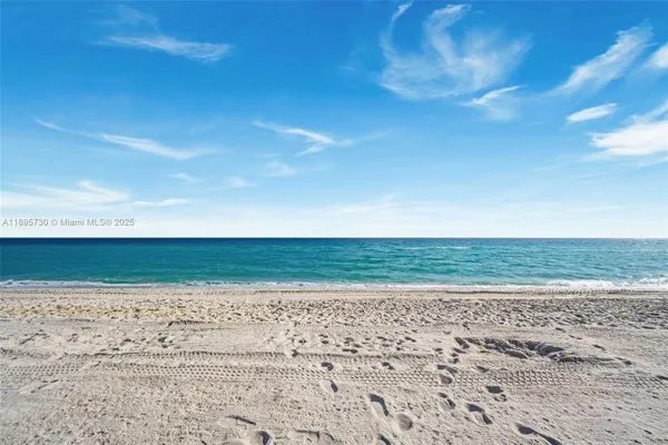 a view of a beach and a yard